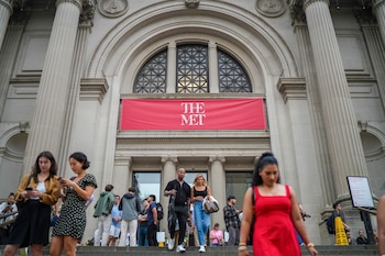 FILE Ñ Visitors outside of the Metropolitan Museum of Art in New York, June 27, 2026. Facing an intense backlash, the influential fashion designer John Galliano has taken the unprecedented step of withdrawing from a planned exhibition in his honor at the Metropolitan Museum of Art. (Ryan Murphy/The New York Times)
