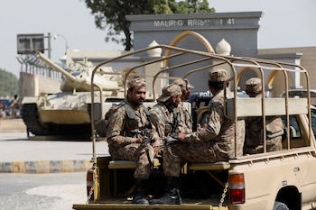 Army soldiers in a vehicle