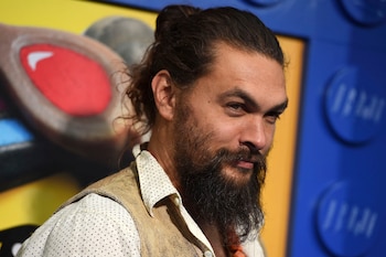 Cast member Jason Momoa arrives