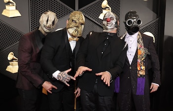 Slipknot pose on the red carpet as they attend the 66th Annual Grammy Awards in Los Angeles, California, U.S., February 4, 2024. REUTERS/Mario Anzuoni