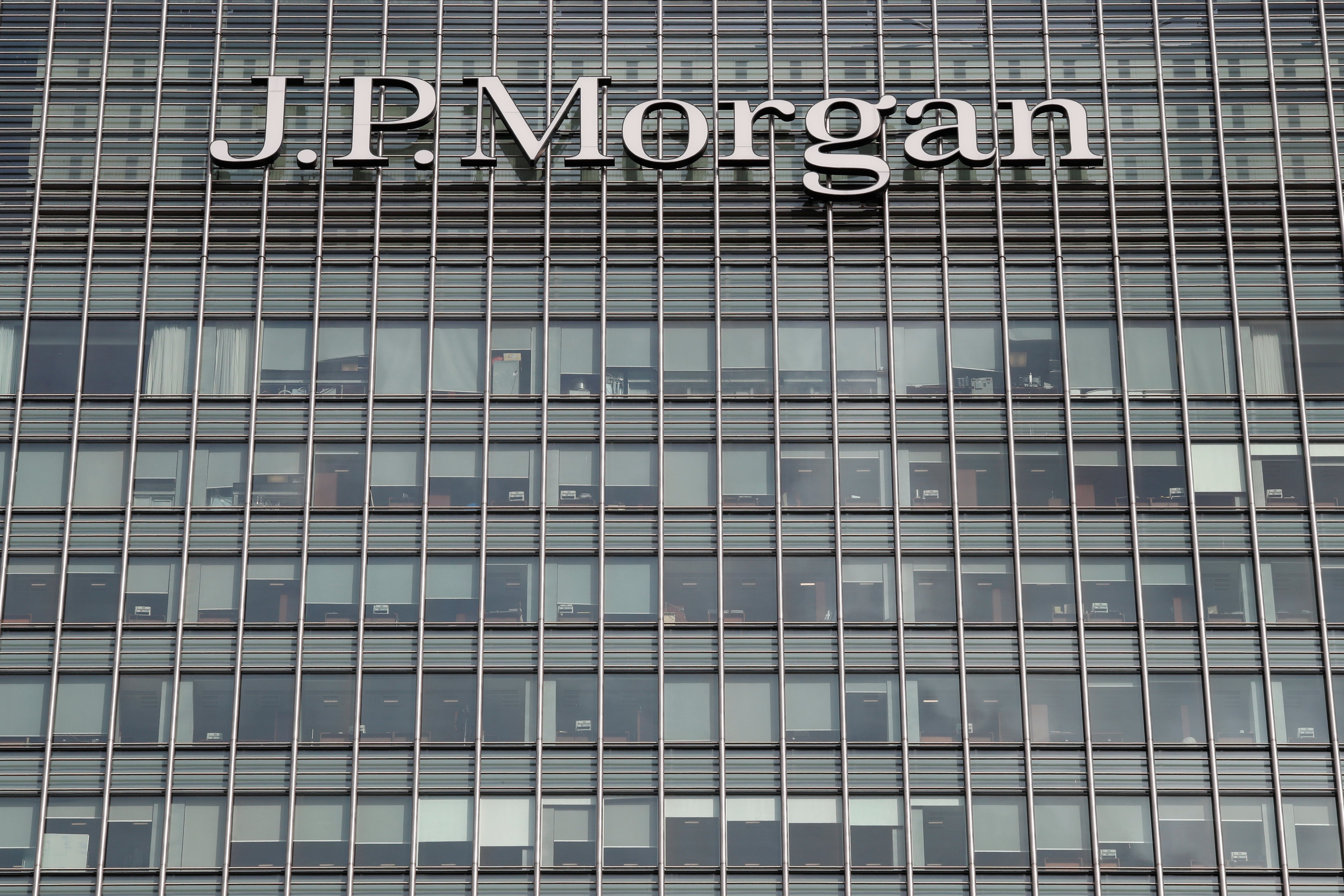 FILE PHOTO: The J.P.Morgan logo is seen at Canary Wharf financial district in London,Britain, March 3, 2016. REUTERS/Reinhard Krause/File Photo