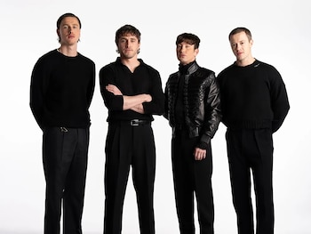 Imagen oficial del elenco de The Beatles