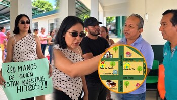 Una mujer sostiene una pancarta de protesta junto a un grupo de personas frente a un gráfico circular de un mapa escolar