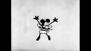 Ilustración en blanco y negro de un ratón de dibujos animados con orejas redondas, nariz grande, manos con guantes y pantalones, saltando con los brazos levantados