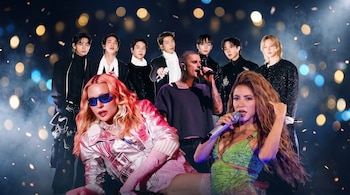 Madonna con gafas y chaqueta plateada, Shakira con top verde, Justin Bieber con micrófono, y siete miembros de BTS. Fondo oscuro con luces bokeh y humo.