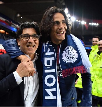Carlos Muguruza con Édinson Cavani
