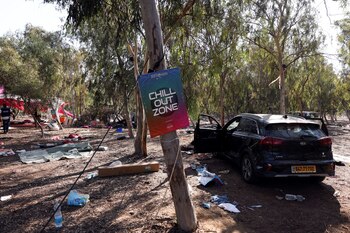A sign reads "chill out zone" at the site of an attack on the Nova Festival by Hamas gunmen from Gaza, near Israel's border with the Gaza Strip, in southern Israel, October 12, 2023. REUTERS/Ronen Zvulun