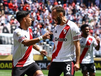 Maxi Meza y Germán Pezzella