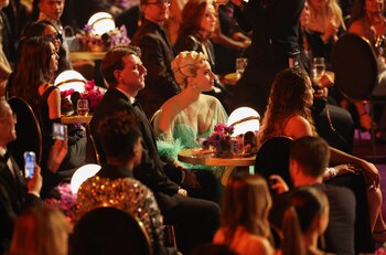 Lady Gaga watches from the audience as Jon Batiste wins the Grammy award for Album of the Year for "We Are" during the 64th Annual Grammy Awards show in Las Vegas, Nevada, U.S. April 3, 2022. REUTERS/Mario Anzuoni