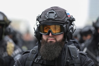 Service members gather in a