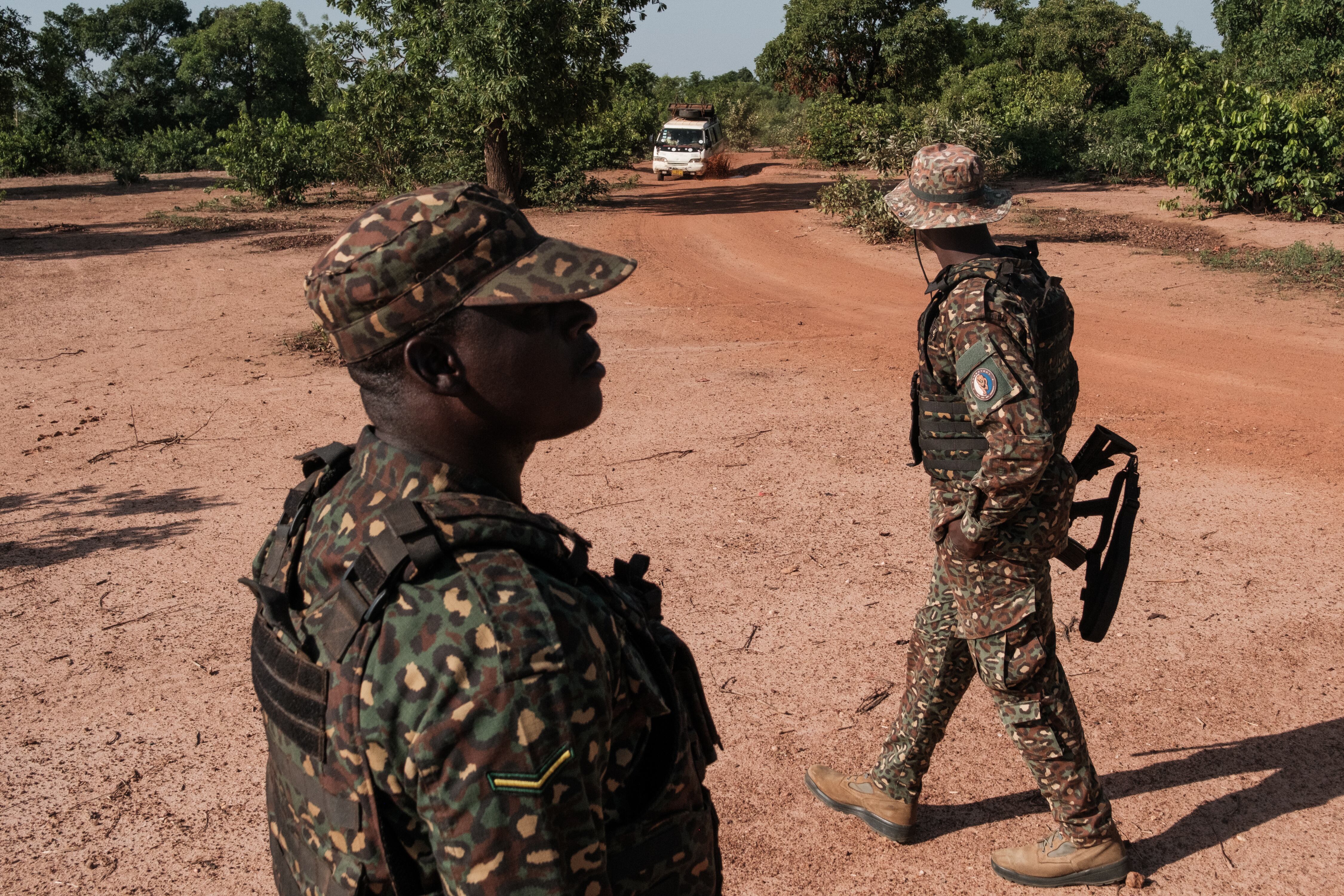Alagba Mubarak Awinkurgo sits at a forward operating base for the Ghana Immigration Service (Guy Peterson/For The Washington Post)