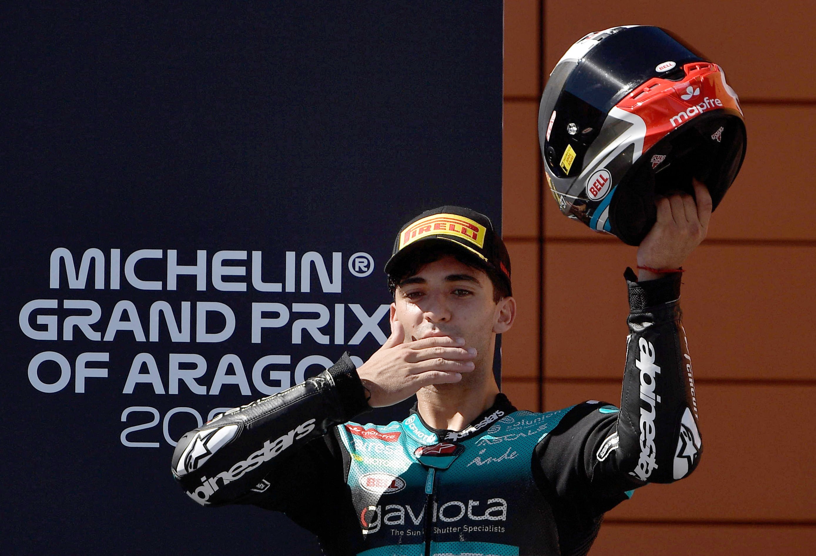 MotoGP - Aragon Grand Prix - Ciudad del Motor de Aragon, Aragon, Spain - August 30, 2026 CFMOTO Aspar Team's Marco Morelli celebrates on the podium after finishing third in the Moto 3 race REUTERS/Pablo Morano