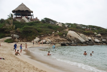 La visita al Tayrona exige registro previo, charla de inducción y un seguro contra accidentes con asistencia al visitante autorizado por Parques Nacionales Naturales - crédito Parques Nacionales y Naturales de Colombia