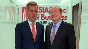 Redrado junto a Robert Merton,