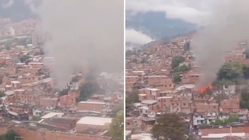 Vecinos del sector utilizaron mangueras y baldes para contener el fuego en Medellín antes de la llegada de los bomberos - crédito Captura video