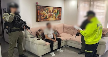 Momento de la lectura de causas de la captura de alias Palizada, en Envigado, Antioquia - crédito Policía Nacional