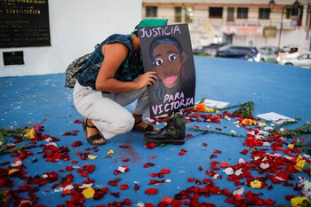 A woman takes part in