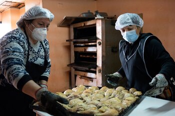 Erika Martinez, left, prepares over