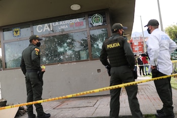 Police officers are seen at