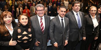 Harfuch junto a otros asistentes