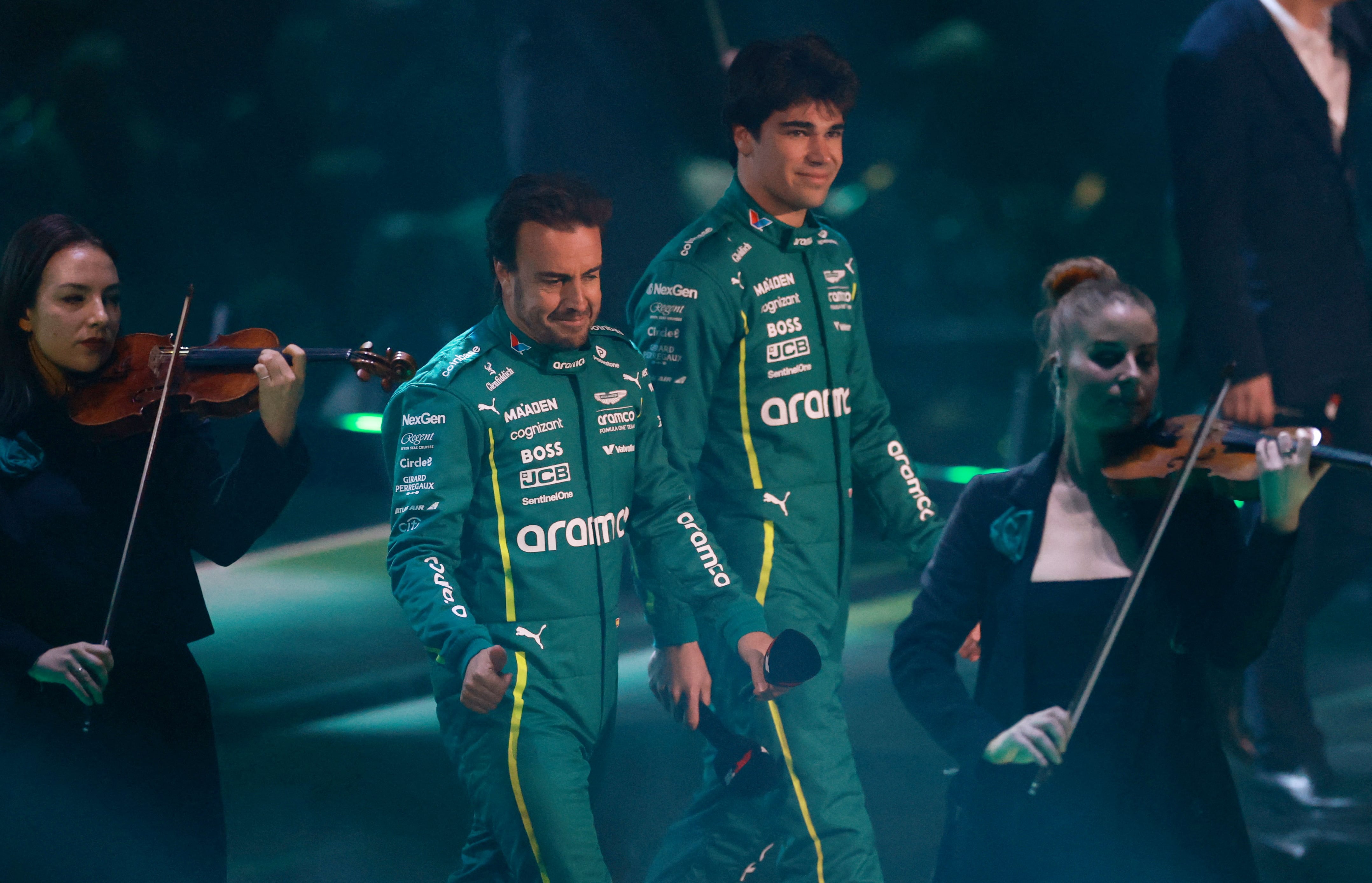 Fernando Alonso y Lance Stroll (REUTERS/Andrew Boyers)