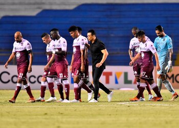 Jugadores y el director técnico