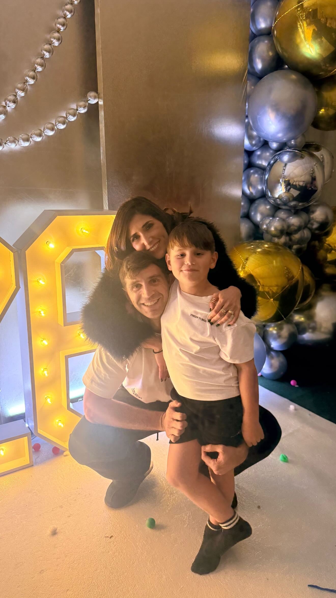 La imagen de Emiliano Martínez con su esposa Mandinha y su hijo Santi