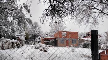 Una casa y el jardín