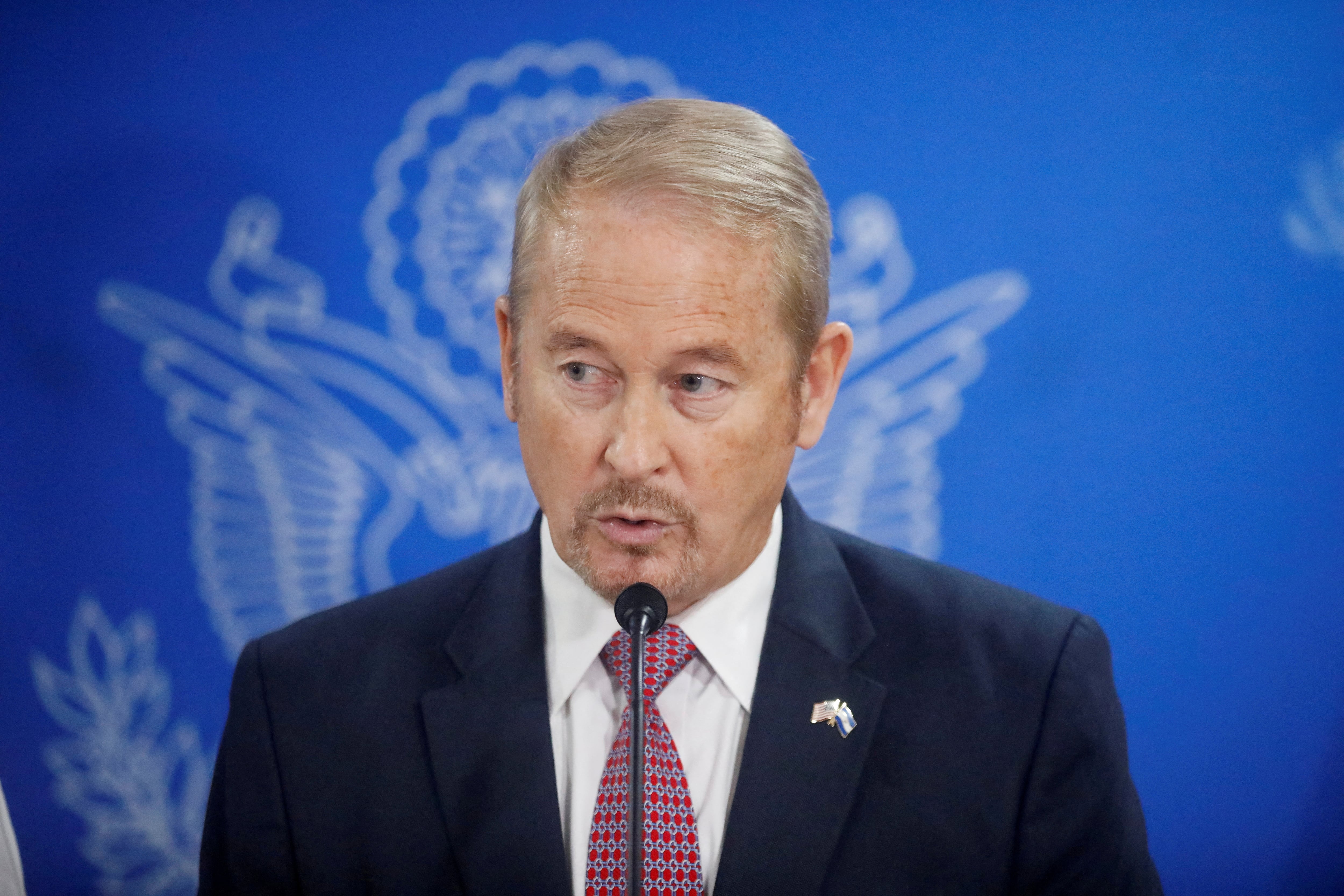 FILE PHOTO: Ronald Johnson, then newly appointed U.S. Ambassador to El Salvador, participates in a news conference at El Salvador International Airport in San Luis Talpa, El Salvador September 4, 2019. REUTERS/Jose Cabezas/File Photo
