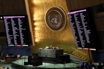 Names of countries are seen on the screen as the voting starts during a special session of the U.N. General Assembly on Russia's invasion of Ukraine, at the United Nations headquarters in New York City, New York, U.S., March 24, 2022. REUTERS/Brendan McDermid
