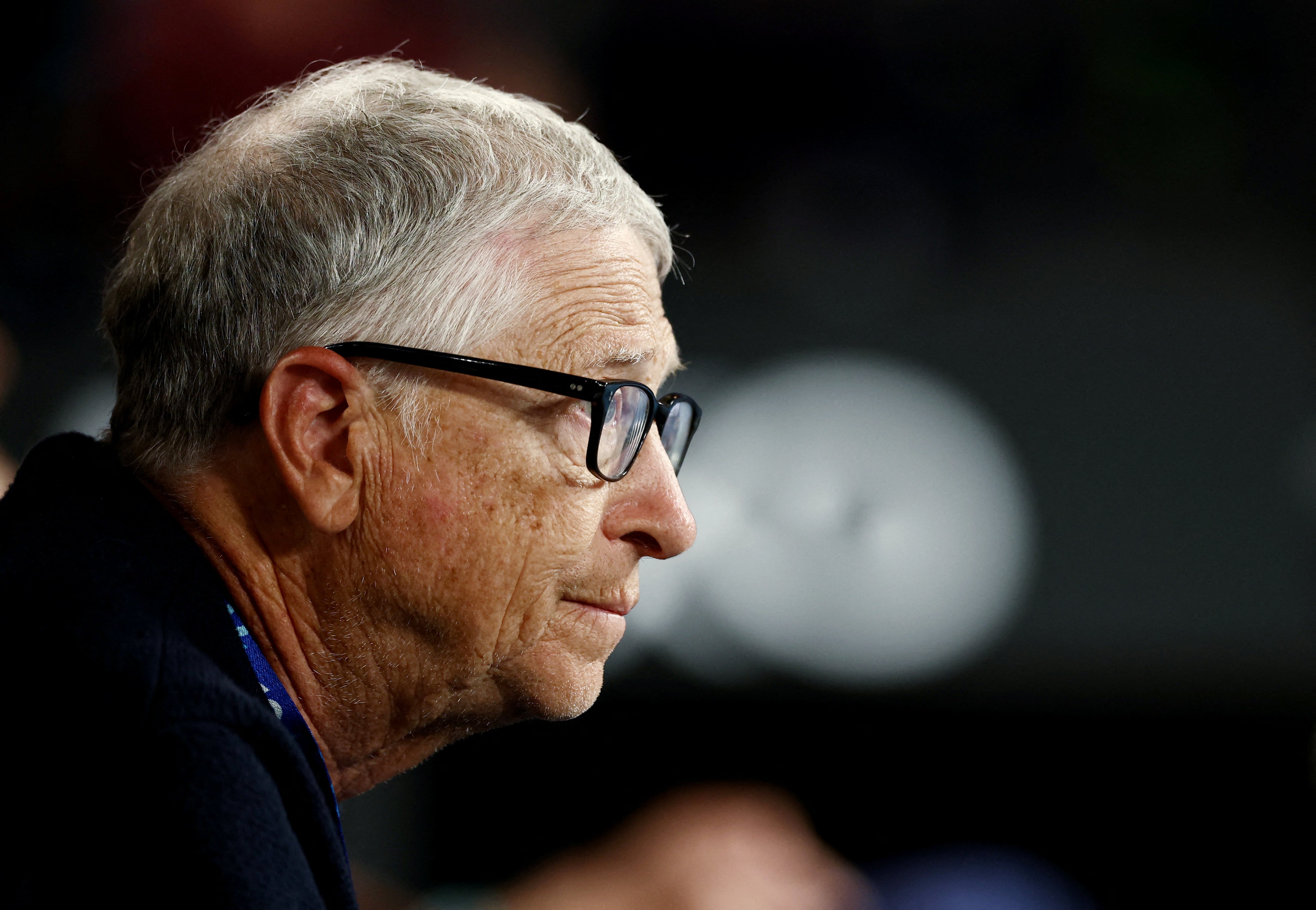 FILE PHOTO: Tennis - Australian Open - Melbourne Park, Melbourne, Australia - January 31, 2026 Bill Gates attends the men's doubles final match between Australia's Jason Kubler and Australia's Marc Polmans and Christian Harrison of the U.S. and Britain's Neal Skupski REUTERS/Tingshu Wang/File Photo