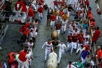 Un momento del encierro. (Vincent West/Reuters)