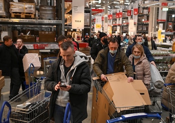 Customers shop in IKEA store