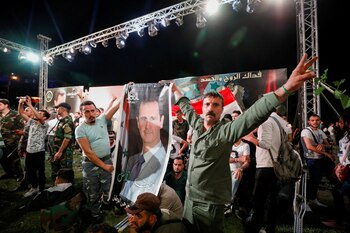 Simpatizantes de Al Assad durante