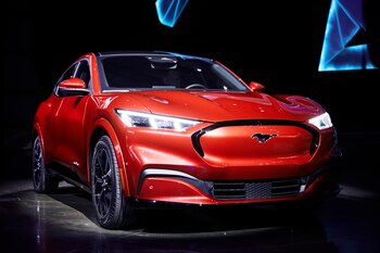 FILE — Ford’s electric vehicle, the Mustang Mach-E, an SUV meant to evoke the company’s storied sports car, in Los Angeles, Nov. 17, 2019. The struggles of traditional automakers to sell electric cars might finally ease in 2021 as Ford, Volkswagen and others introduce promising new models. (Ryan Young for The New York Times)