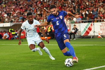 Nelson Semedo y Josip Sutalo durante uno de los últimos encuentros entre Portugal y Croacia - crédito Pedro Nunes/REUTERS