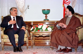 El presidente iraní en 2001, Mohammad Khatami, reunido con el primer ministro libanés Rafiq Hariri (REUTERS/STRINGER)