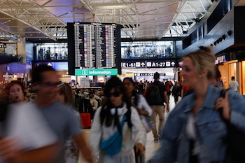 People walk at Leonardo da