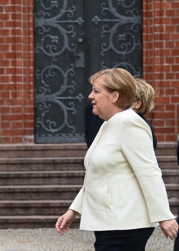 Angela Merkel
Hendrik Schmidt/Pool via