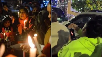 Mujer protege una vela… que