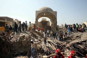 Local residents and rescuers search