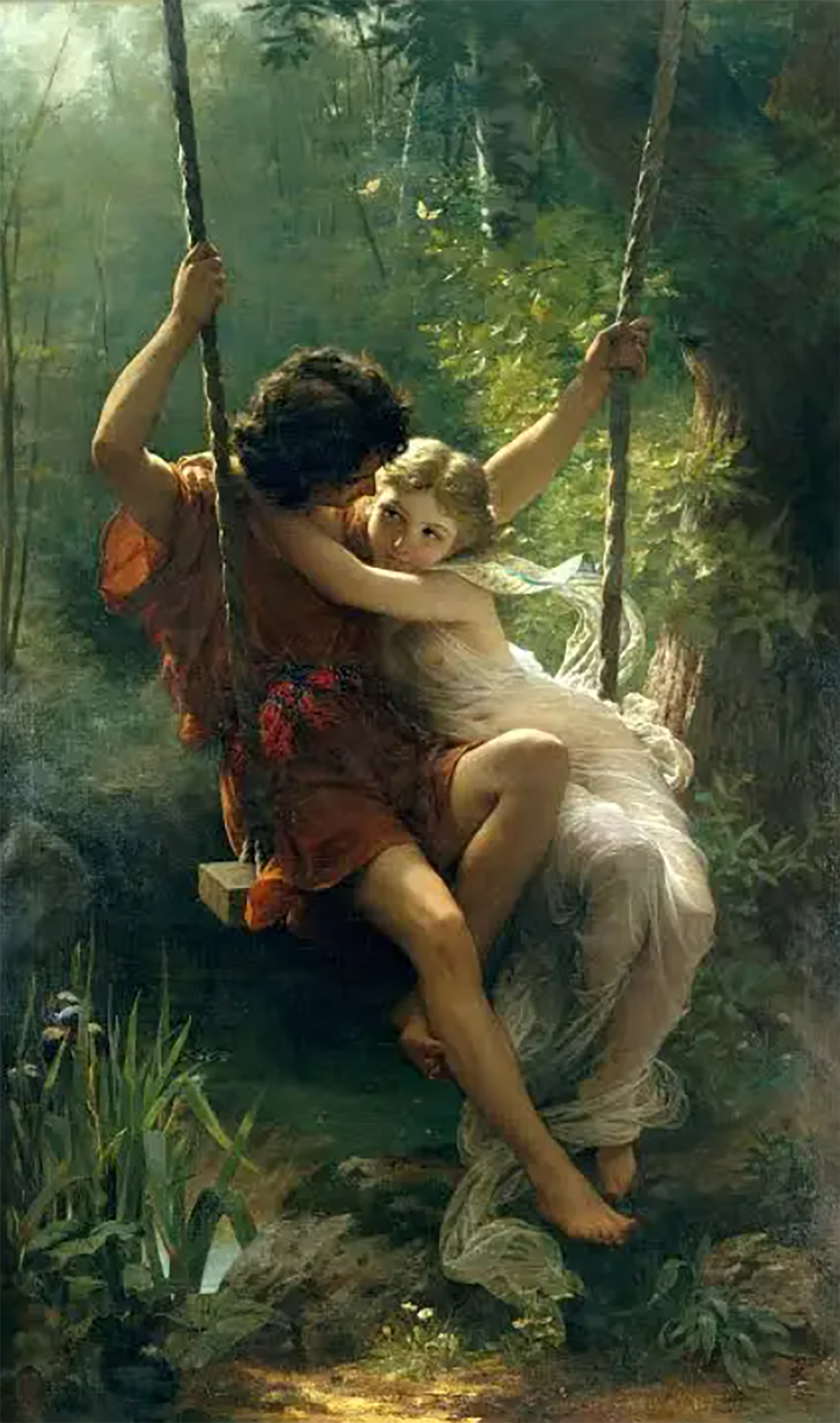 Una pareja de jóvenes se abraza sobre un columpio en la obra
