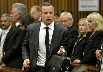 PRETORIA, SOUTH AFRICA - MARCH 3 (SOUTH AFRICA OUT): Oscar Pistorius and June Steenkamp at the Pretoria High Court on March 3, 2014, in Pretoria, South Africa. Pistorius, stands accused of the murder of his girlfriend, Reeva Steenkamp, on February 14, 2014. This is Pistorius' official trial, the result of which will determine the paralympian athlete's fate. (Photo by Herman Verwey/Foto24/Gallo Images/Getty Images)