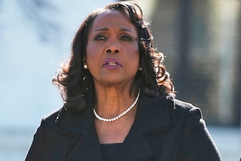 FILE - Federal Reserve Board of Governors member Lisa Cook leaves the Supreme Court in Washington, Jan. 21, 2026. (AP Photo/Mark Schiefelbein, File)
