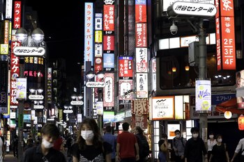 Pedestrians wearing protective masks in