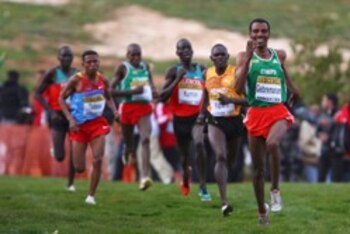 AMMAN, JORDAN - MARCH 28: Gebre-egziabher Gebremariam (r) of Ethiopia on his way to winning the men's senior race at the 37th IAAF World Cross Country Championships at the Bisharat Golf Club on March 28, 2009 in Amman,Jordan. (Photo by Michael Steele/Getty Images)