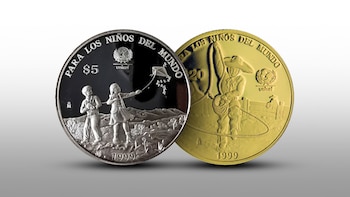 Monedas con niños. (Infobae)