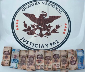 Detenidos con medio millon (Foto: Guardia Nacional)