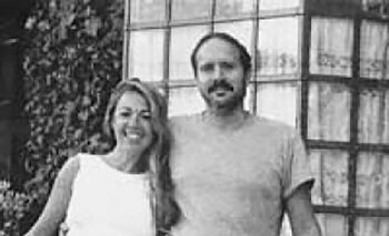 Santos junto a su esposa