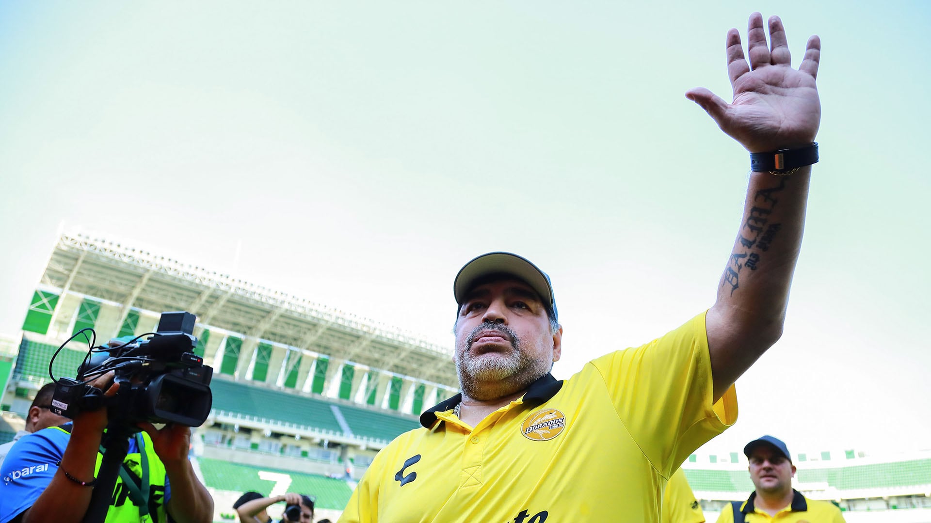 CUERNAVACA, MEXICO - OCTOBER 06: Diego Armando Maradona, coach of Dorados de Sinaloa greets the fans prior to the 11th round match between Zacatepec and Dorados as part of the Torneo Apertura 2018 Ascenso MX at Agustin 'Coruco Diaz Stadium on October 6, 2018 in Cuernavaca, Mexico. (Photo by Hector Vivas/Getty Images)